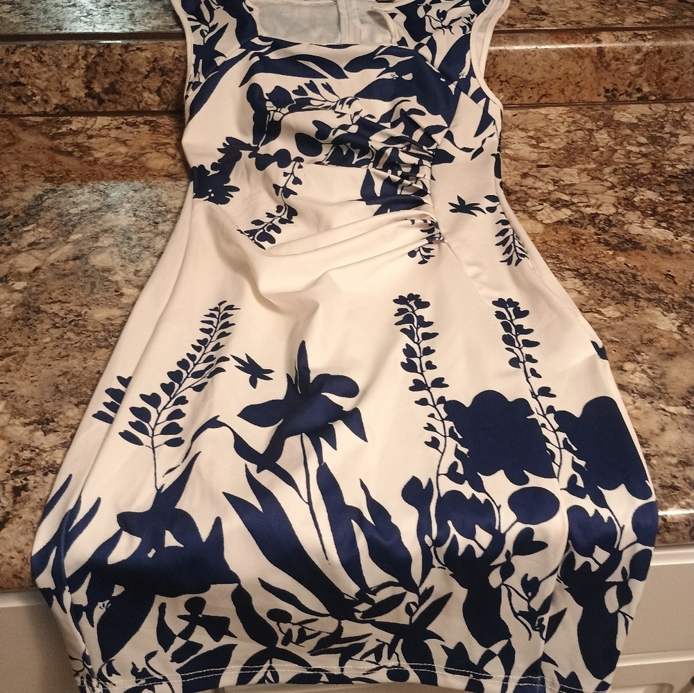 Women's Navy and white dress cap sleeves. Size 4